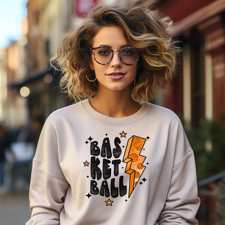 a woman wearing a sweatshirt with a lightning bolt on it