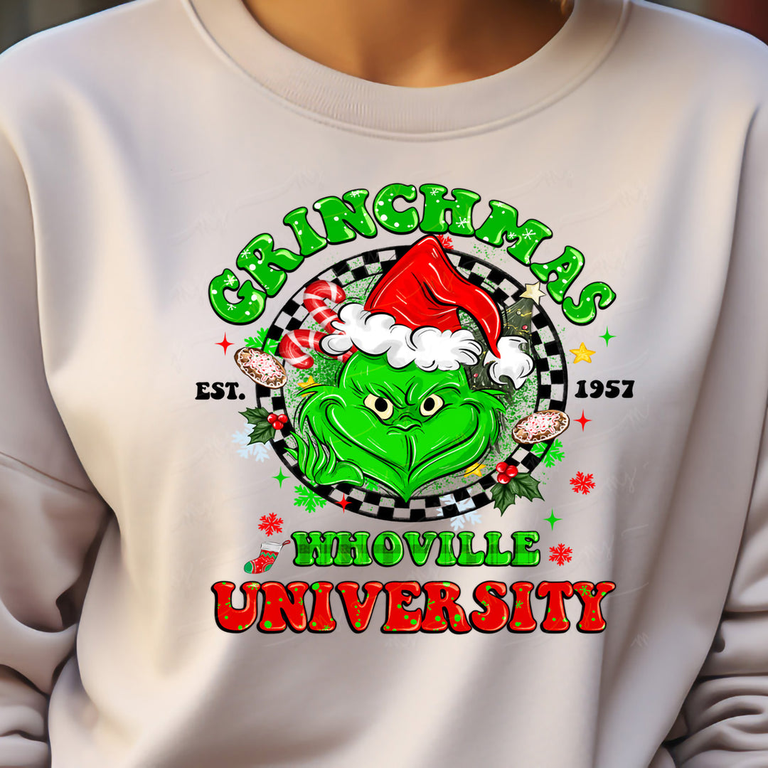 a person wearing a white sweatshirt with a green grin face on it