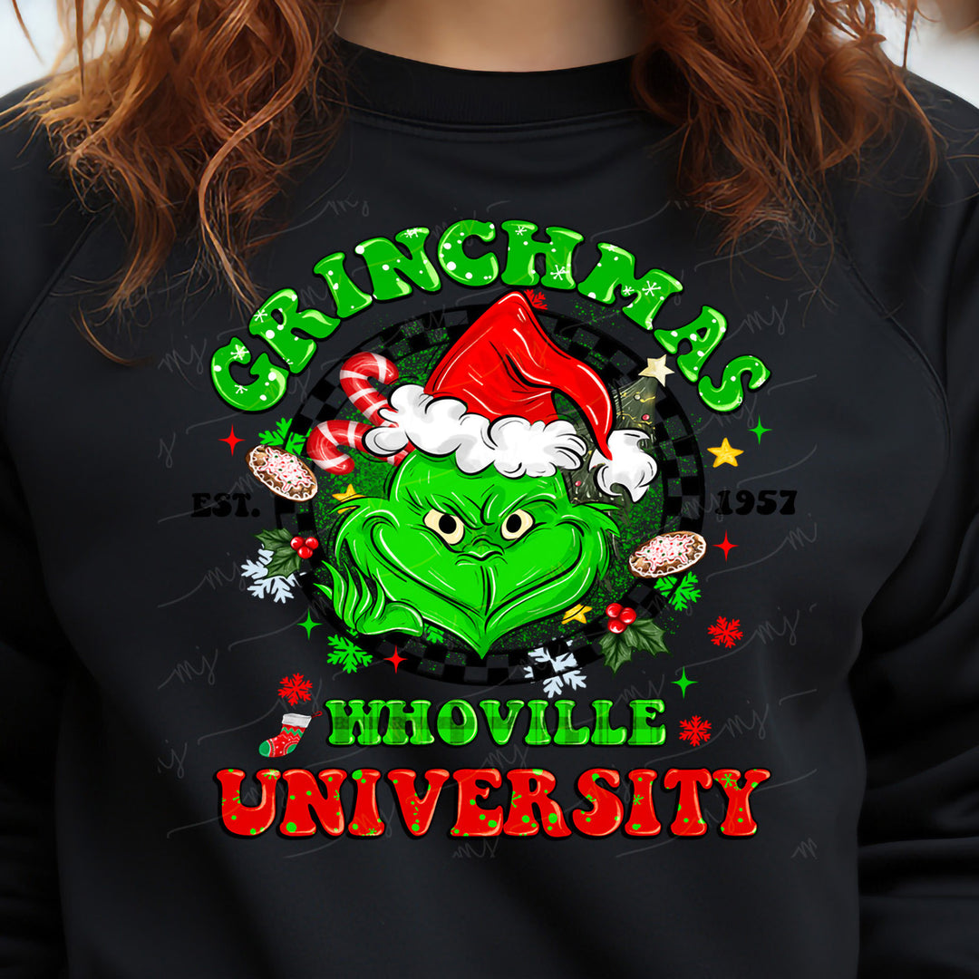 a woman wearing a black sweatshirt with a christmas hat on her head