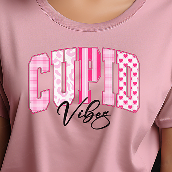 a close up of a person wearing a pink shirt