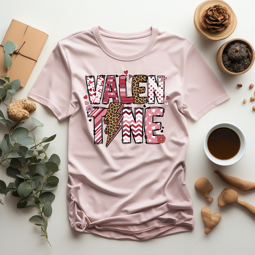 a pink t - shirt with the word valen time printed on it