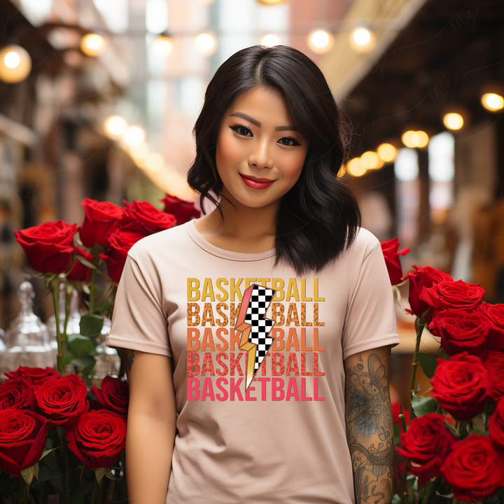 a woman standing in front of a bunch of roses