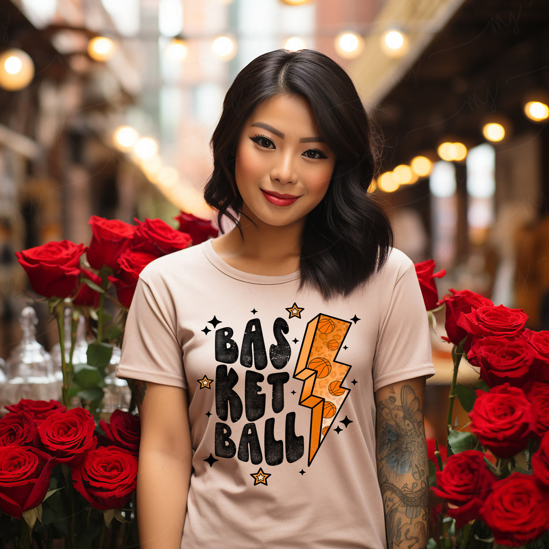 a woman standing next to a bunch of red roses