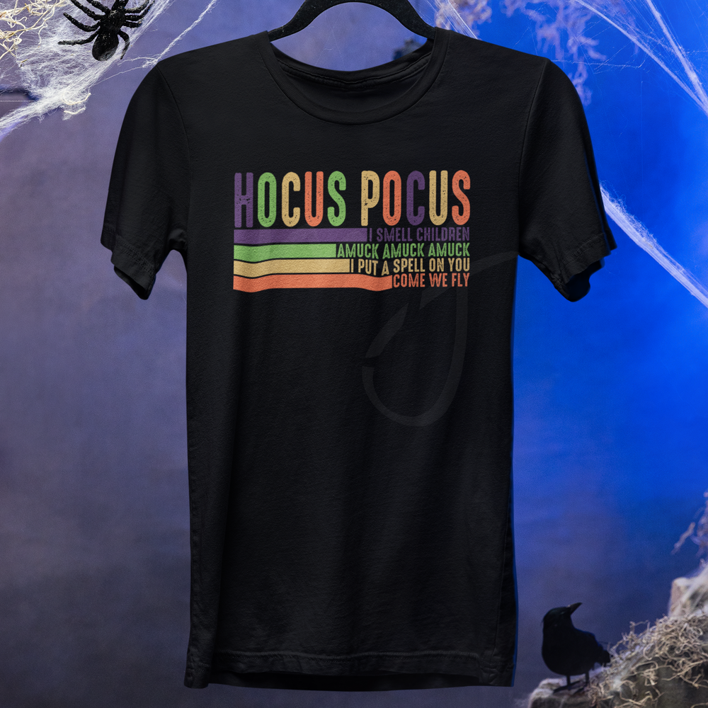 a black t - shirt with the words hoccus po us on it