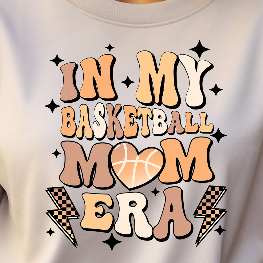 a woman wearing a t - shirt that says in my basketball mom era