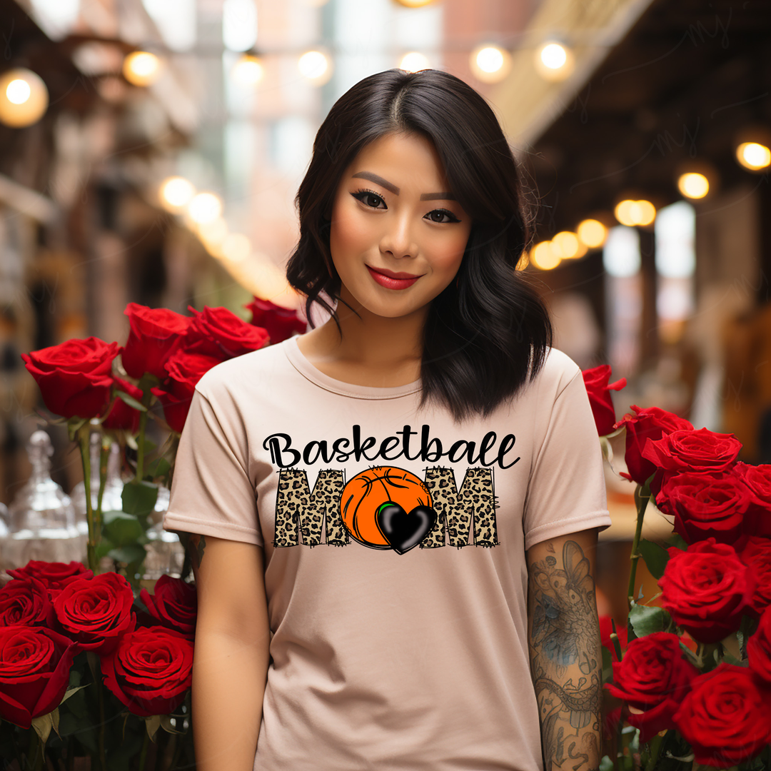 a woman standing in front of a bunch of roses