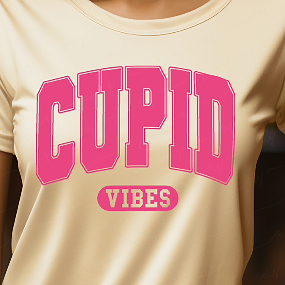 a close up of a person wearing a shirt with the word cupid on it