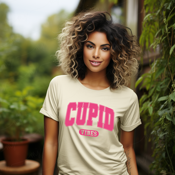 a woman with curly hair wearing a cupid t - shirt
