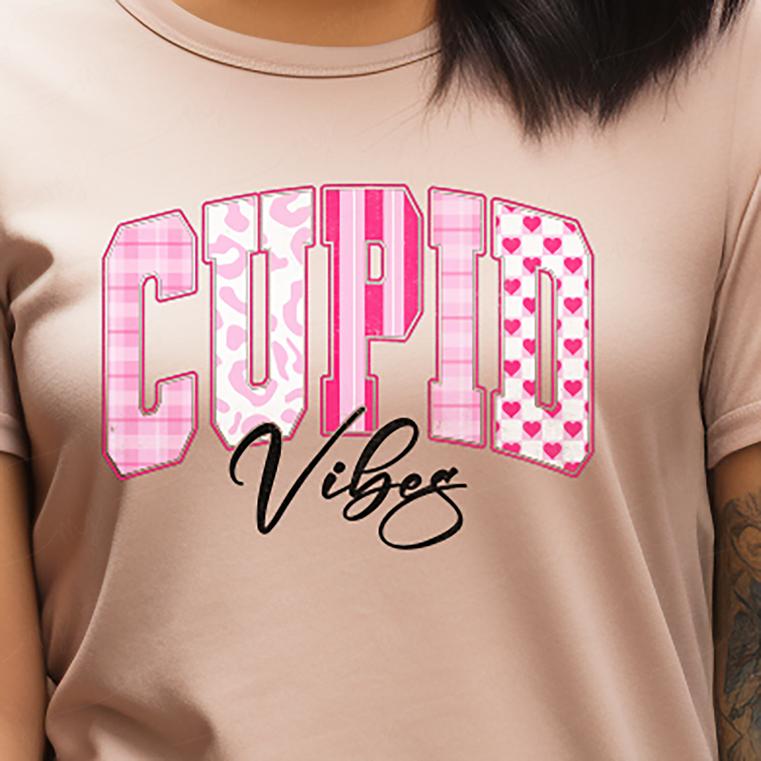 a woman wearing a shirt that says cupid vibes
