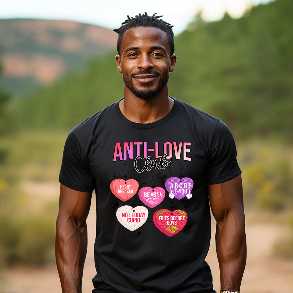 a man wearing a t - shirt with hearts on it