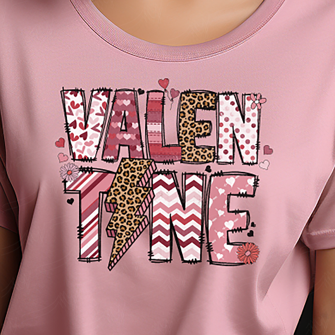 a woman wearing a pink shirt with a cheetah print