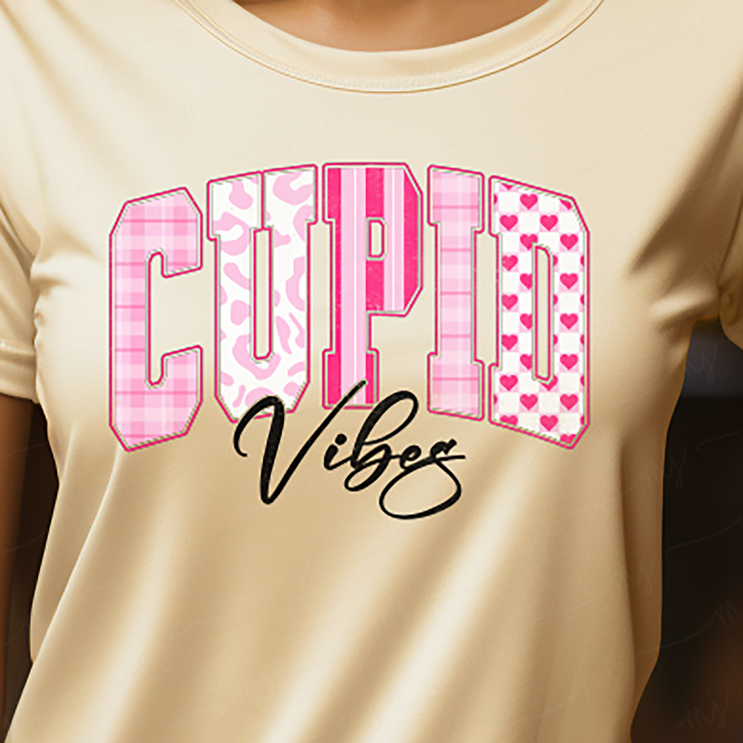 a woman wearing a t - shirt that says cupid vibes