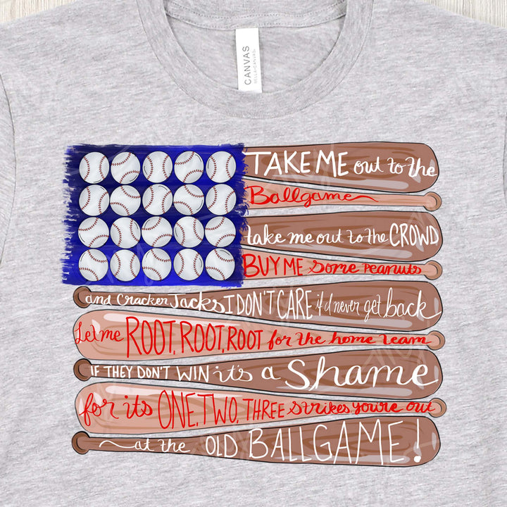 a t - shirt with baseballs on it and the words take me out to